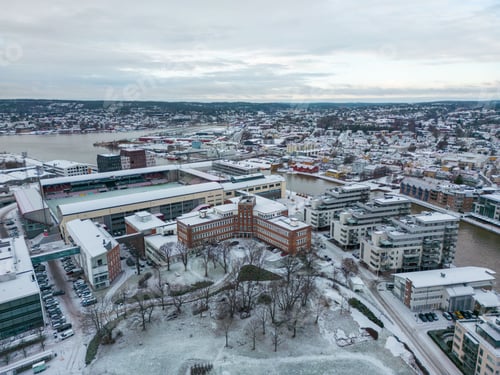Preview: a view of snow covered buildings and a snowy city skyline