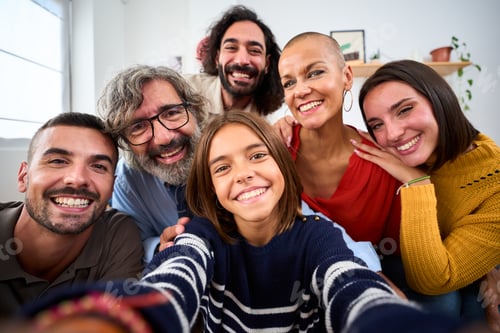 Preview: Joyful Caucasian family smiling hugging taking a selfie photo indoor. Happy people in domestic life.