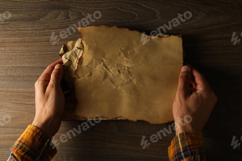 Preview: Columbus Day. An old sheet of paper on the table