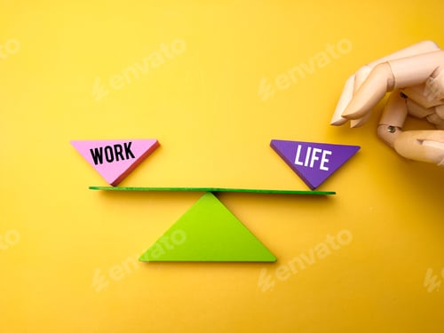 Preview: A colored triangle is in the middle balancing the words WORK and LIFE together with a wooden hand. B