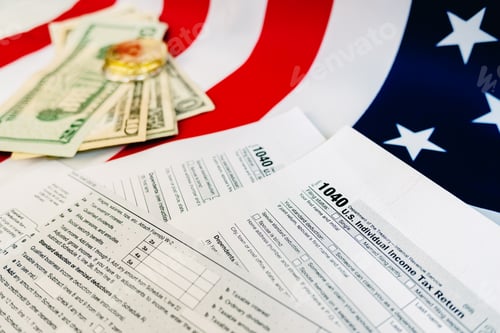 Preview: Dollar bills on a table in which the 1040 American tax payment form is filled out.