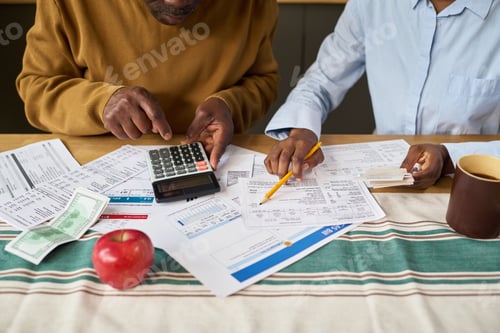 Preview: Senior Couple Managing Finances at Home