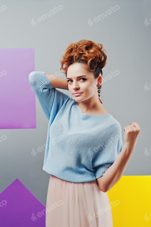 Preview: Studio portrait of young girl near art colored blanks.