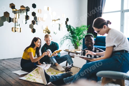 Preview: Young diverse students discussing project in modern workspace