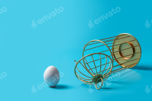 Preview: Upside down open cage with an egg outside on a blue background. concept of liberation from slavery.