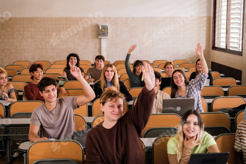 Preview: Group of students in class raising their hands to answer questions, focus on the girl