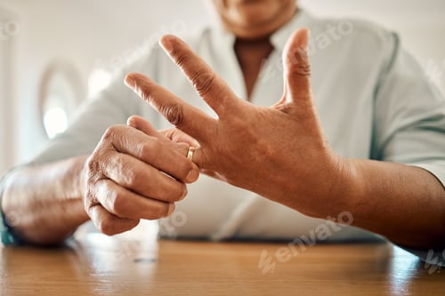 Preview: Divorce, ring and hand of old woman at home for separation, breakup and conflict. Marriage problem,