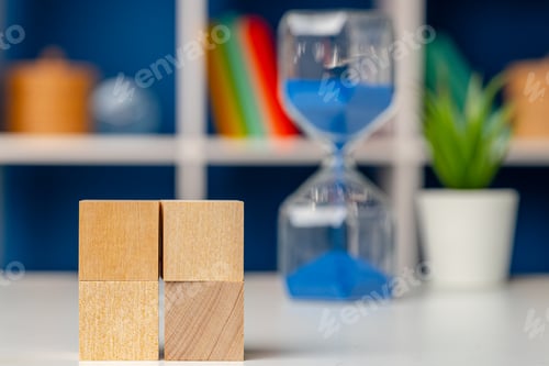Preview: Blank wooden cubes with copy space for your design on office working table