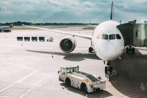 Preview: Aircraft Plane Boarding Passengers In Airport Terminal. Aircraft