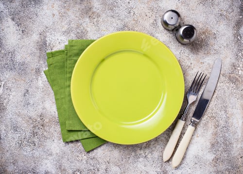Preview: Empty plate on concrete table