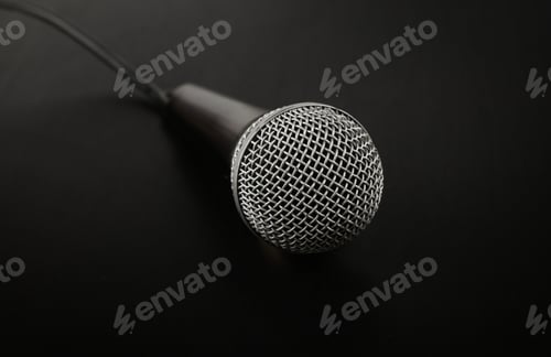 Preview: Microphone with cable high angle close up over black