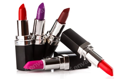 Preview: Lipsticks tubes of different colors on white background