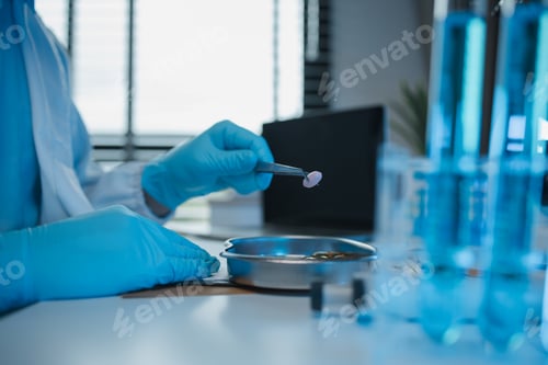 Preview: a scientist is testing various pills in order to improve their quality an effectiveness in the labor