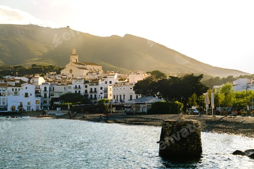 Preview: Cityscape of a Cadaques, Spain by the seaside during a fantastic golden hour