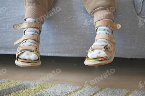Preview: Child cerebral palsy disability, legs orthosis.