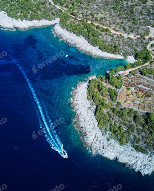 Preview: Aerial view of a coastal landscape with a boat in the sea