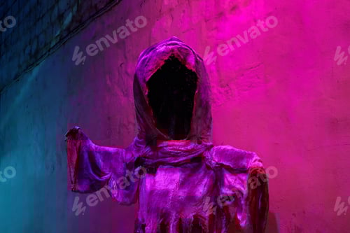 Preview: Silhouette of scary mythical ghost against wall with duotone illuminated colors