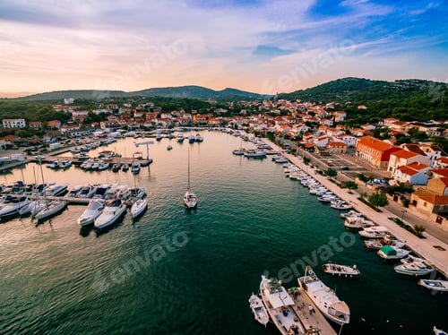 Preview: Aerial drone view of small marina with boats and yachts docked in Croatia