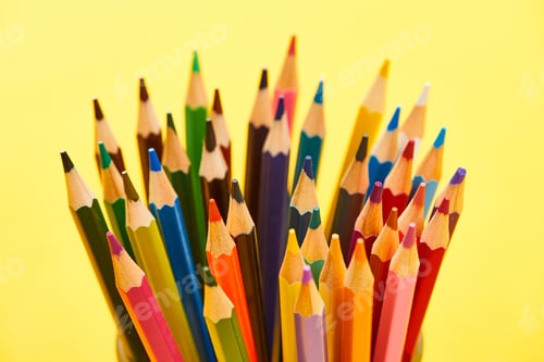 Preview: Sharpened And Bright Color Pencils Isolated on Yellow