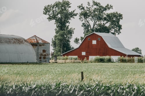 Preview: Landscape view of a red barn on a farm in Indiana