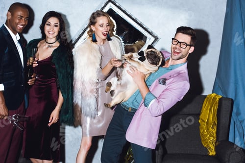 Preview: group of friends on party with little pug puppy