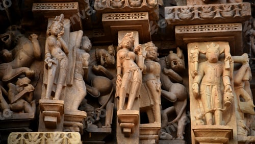 Preview: Stone carving bas relief sculptures on Khajuraho Temple, India.