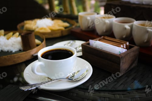 Preview: Tasting balinese coffee and traditional desserts in Ubud. Coffee background and traditional desserts