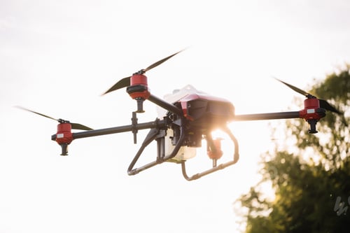Preview: Agriculture drone fly to sprayed fertilizer on the sweet corn fields.