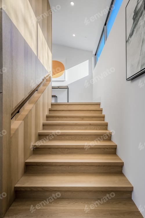 Preview: Wooden stair tread in the contemporary interior beneath staircase.