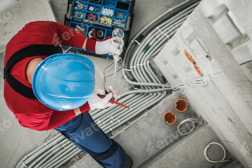 Preview: Professional Electrician Checking Wires