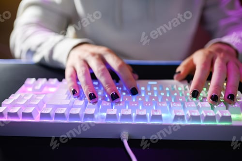 Preview: Unrecognizable person sitting with hand on keyboard