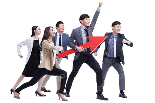 Preview: Fashionable businessperson punching the air with red arrow sign