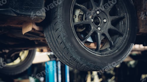 Preview: Close up the old tire at the repair garage.Repair car service concept