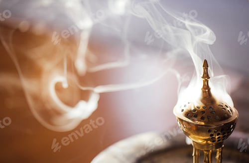 Preview: Brass incense burner emitting aromatic smoke, intricate design