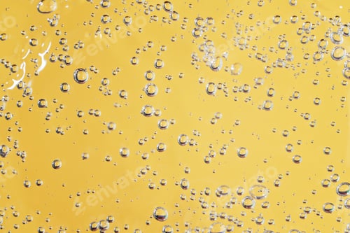 Preview: Close up macro Aloe vera gel cosmetic texture yellow background with bubbles
