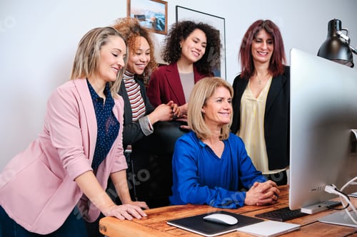 Preview: Business colleagues having an online meeting while working together in the office.