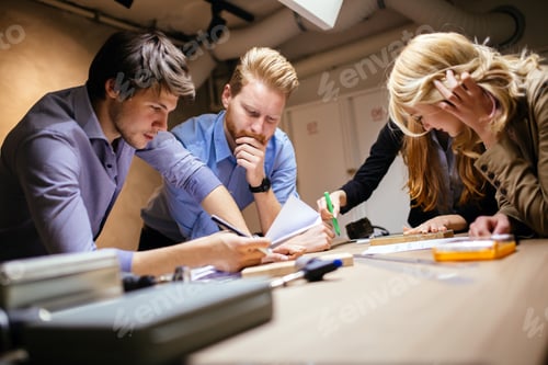 Preview: Business people collaborating in office and working on project together