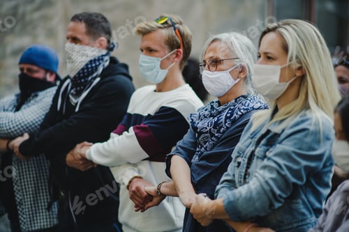 Preview: Group of people activists protesting on streets, march and demonstration concept.