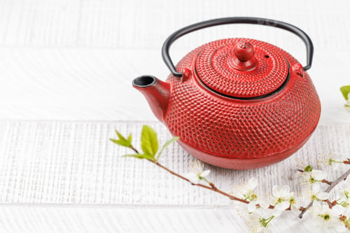 Preview: Table with teapot adorned with cherry blossom branch