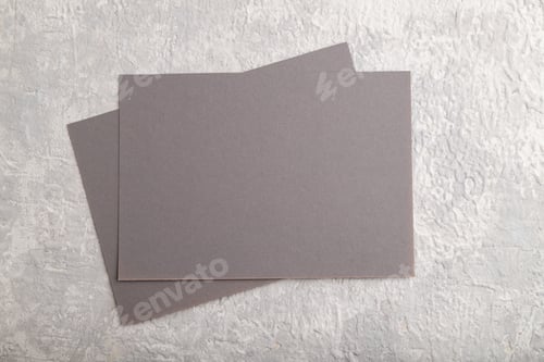 Preview: Gray paper business card, mockup on gray concrete background. Blank, flat lay, top view