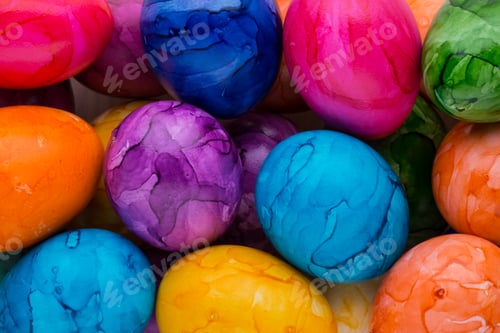 Preview: Easter eggs painted in colors on a white background.