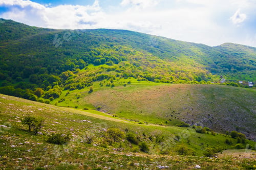 Preview: Picturesque view, rain clouds in mountains