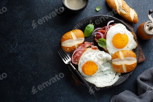 Preview: Eggs with bacon served on plate