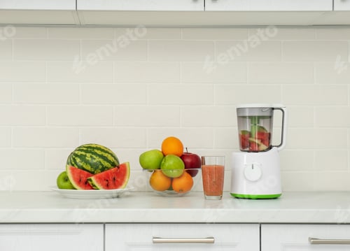 Preview: Blender and smoothie ingredients on counter in kitchen