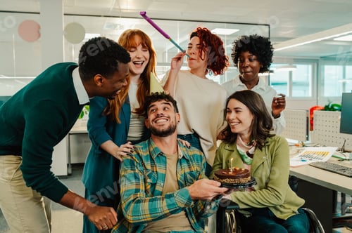 Preview: A diverse team celebrating a birthday at the office.