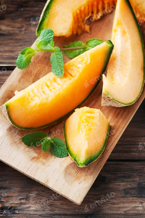 Preview: Sweet orange melon on the wooden table