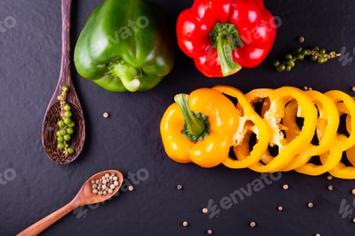 Preview: Three sweet peppers on a wooden background, Cooking vegetable salad