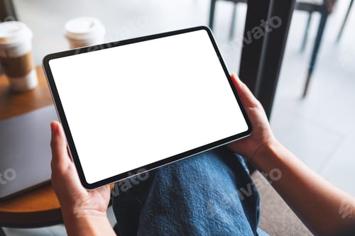 Preview: Mockup image of a woman holding digital tablet with blank white desktop screen