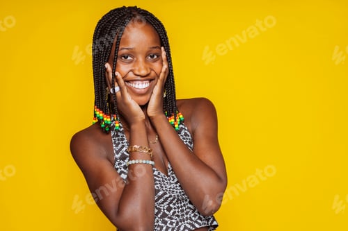 Preview: Young african woman with hands on cheek