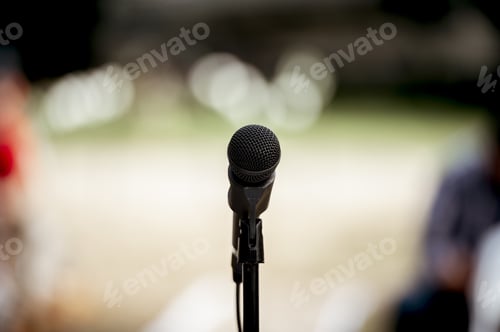 Preview: Closeup shot of a microphone stand on blurred background
